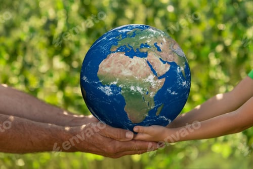 Preview: Senior man and child holding Earth planet. Elements of this image furnished by NASA