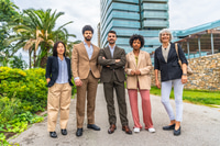 Preview: Business people standing proud looking at camera in the city