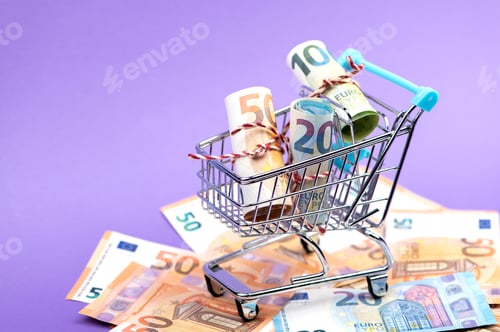 Preview: Shopping cart full of roll euro banknotes.