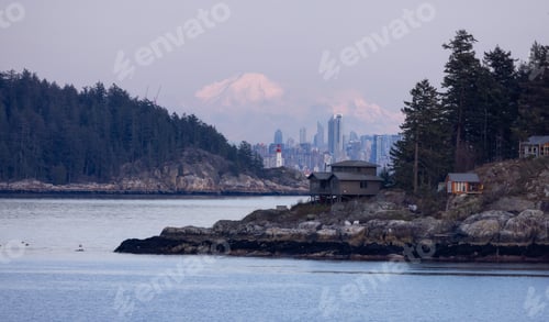Preview: Cabins on Passage Island with Downtown City Buildings and Lighthouse Park