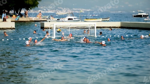 Preview: Male water polo team having game in open sea water. July, 2023, Kotor, Montenegro.