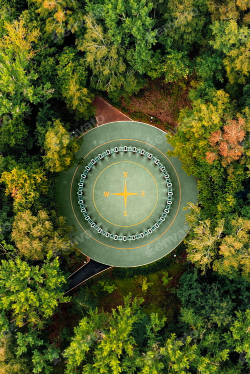 Preview: Aerial drone view of Rose of Wind sign in city park