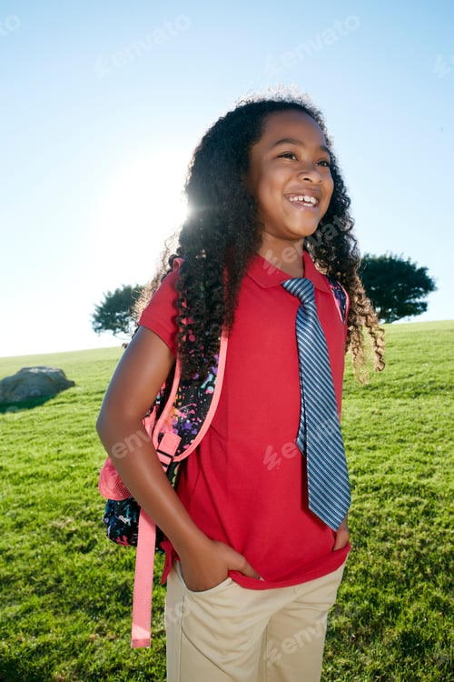 Preview: Young mixed race girl in pink shirt and formal tie, wearing a backpack