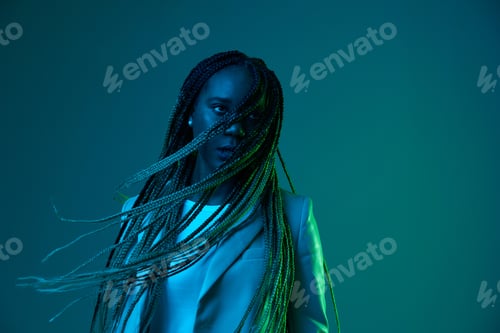 Preview: African american woman portrait business smile and fashion wearing glasses on blue background in