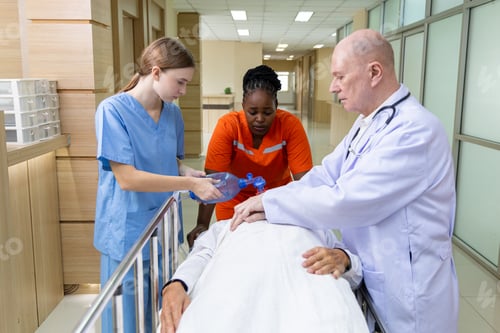 Preview: Emergency medical team rushing patient on stretcher