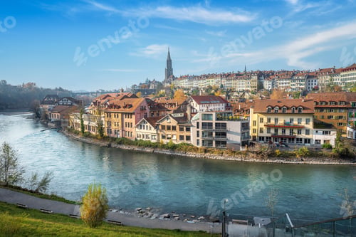 Preview: Bern city Skyline with Aare river and Bern Minster Cathedral tower on background - Bern, Switzerland
