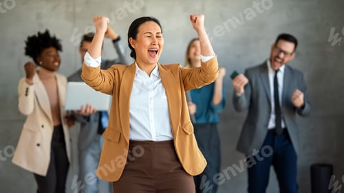 Preview: Excited overjoyed diverse business people, team celebrate corporate victory together in office