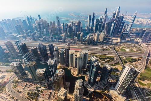 Preview: City downtown aerial view of Dubai skyscrapers at sunset