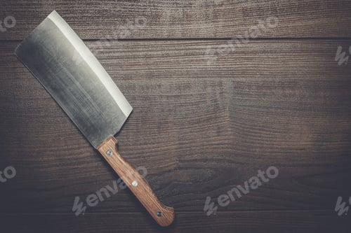 Preview: kitchen knife on the brown wooden table