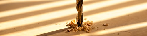 Preview: Horizontal banner format 4:1 with drill bit that drills a wooden board