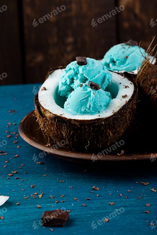 Preview: Blue ice cream in coconut bowl.