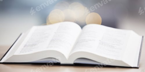 Preview: Religion, christian and bible book on a table for praying, spiritual faith or holy worship to God.