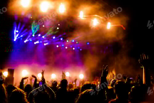 Preview: Crowd Enjoying Exciting Concert with Colorful Lights