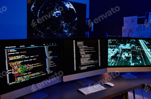 Preview: Row of three computer monitors with coded data on screens