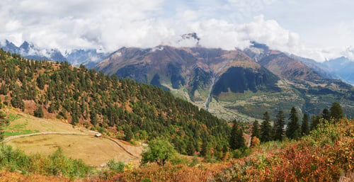 Preview: Fantastic golden autumn landscape between the rocky mountains in Georgia. Malvnychi snow-capped