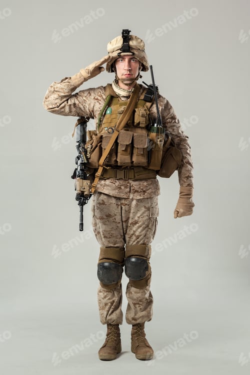 Preview: Soldier saluting while wearing military gear with a rifle and equipment