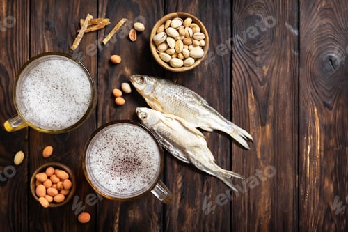 Preview: Two Glass of Beer with foam and snacks on a wooden rustic background.