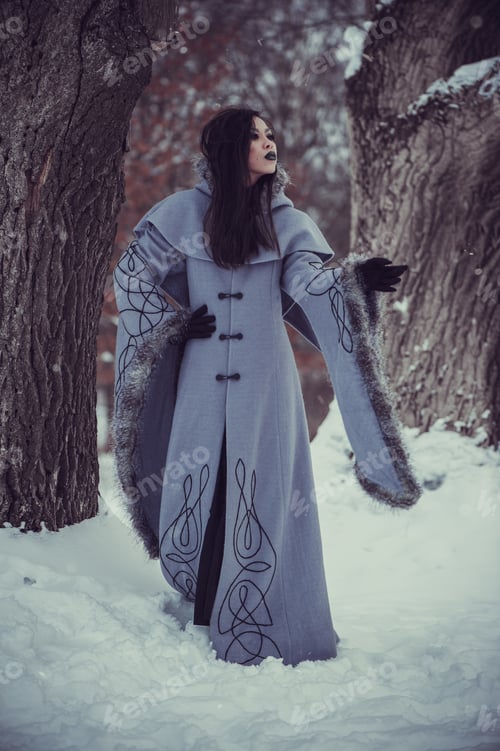 Preview: Fairytale Of Young Woman Dressed In Long Sleeved Coat At Winter With Snow Outdoors