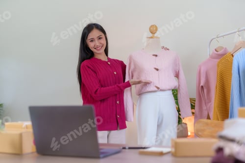 Preview: Beautiful Asian online business owner who sell cloth online and explain the feature, prices