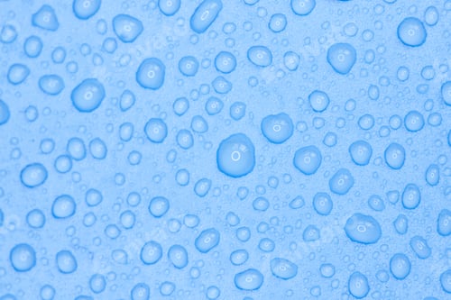 Preview: Random water drops on the blue PVC surface