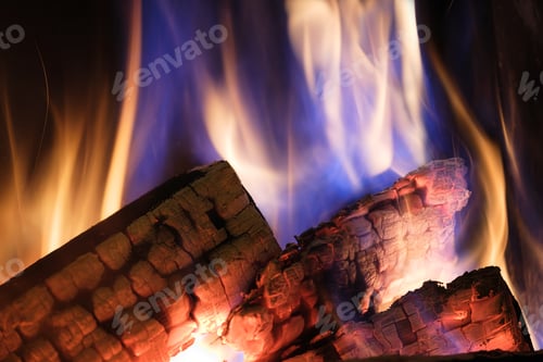 Preview: A fireplace with burning logs. Fire in the fireplace.