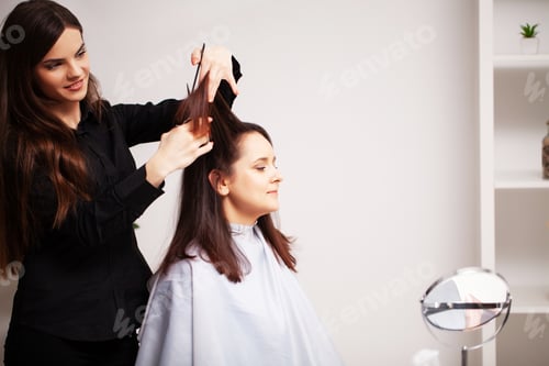 Preview: Woman Getting a Haircut in Bright Hair Salon