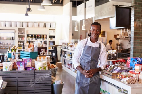 Preview: Portrait Of Male Employee Working In Delicatessen