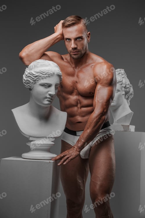 Preview: A muscular masculine man wearing only underwear