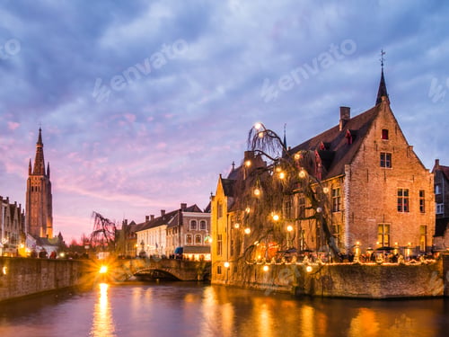 Preview: Beautiful view of a canal surrounded by buildings in Bruges, Belgium