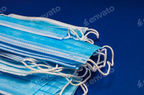 Preview: Close-up and detail of medical hygienic mask, face protective surgical masks isolated.