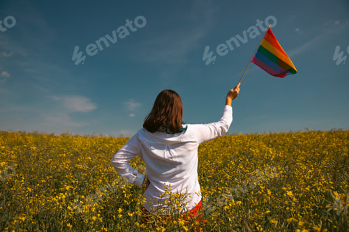 Preview: Young woman with LGBT flag.