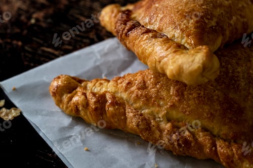 Preview: Flaky pastry laid on paper napkin