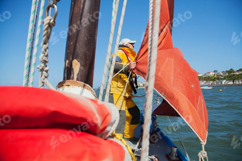 Preview: Senior man on sailing boat