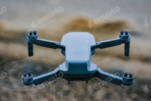 Preview: Quadcopter flying above the ground