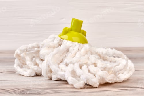 Preview: Mop for cleaning floor, wooden background.