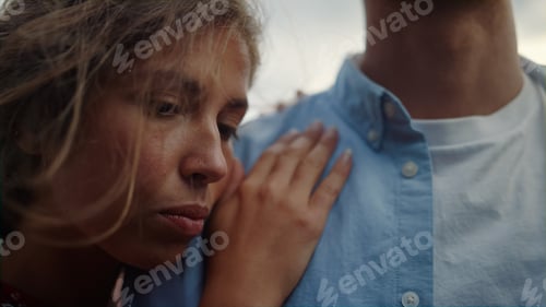 Preview: Closeup couple having date outdoor. Woman hugging unknown man in summer outside