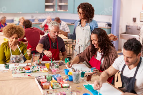 Preview: Group Of Mature Adults Attending Art Class In Community Centre With Teacher
