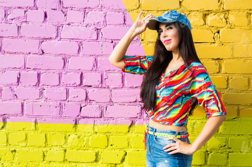 Preview: Street dance, freestyle and jazz funk concept - Beautiful girl hip-hop dancer over brick wall with