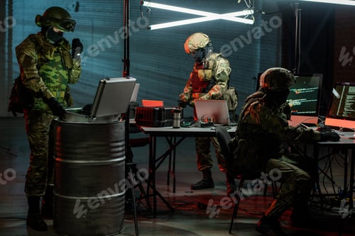 Preview: Team in Military Gear Working on Cyber Operation