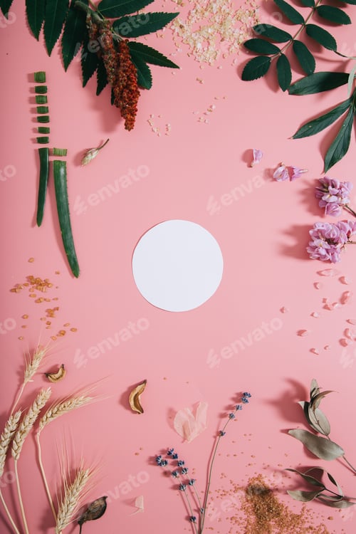 Preview: Creative flat lay top view of empty paper page mock up on pastel millennial pink paper background.