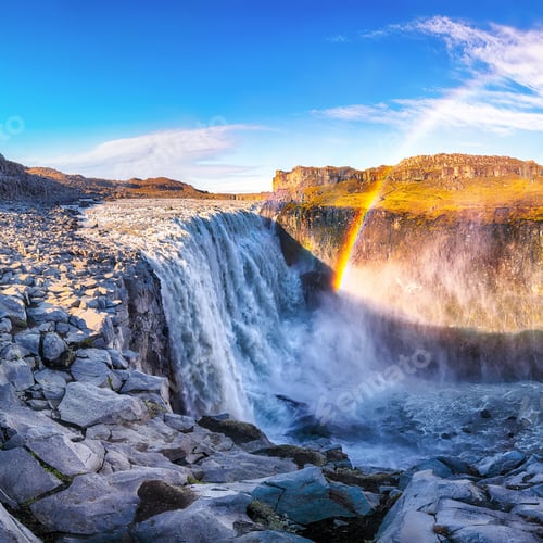 Preview: Breathtaking sunrise view of the most powerful waterfall in Europe called Dettifoss with rainbow