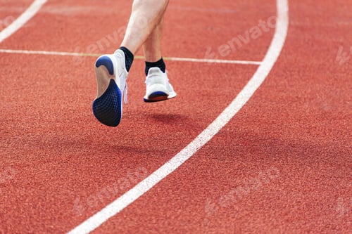 Preview: Close-up of the legs of a runner man. Athletic man runs.
