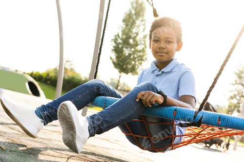 Preview: Beautiful happy african american family bonding at the park