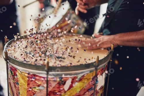 Preview: In sync to Brazilian beats. Closeup shot of a musical performer playing drums with his band.