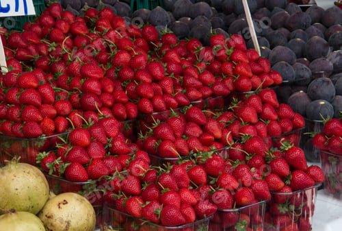 Preview: lot of strawberries on the counter market. A lot of strawberries, strawberries on the market counter