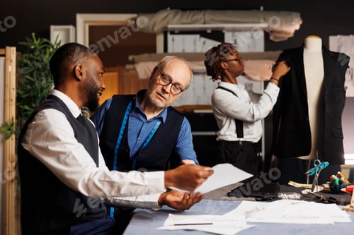Preview: Tailor working with diverse apprentices