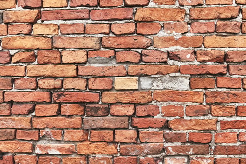 Preview: Old red brick wall, grunge background. Copy space for text