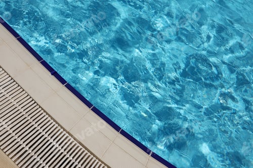 Preview: Blue water in swimming pool outdoors under the shiny sunlight