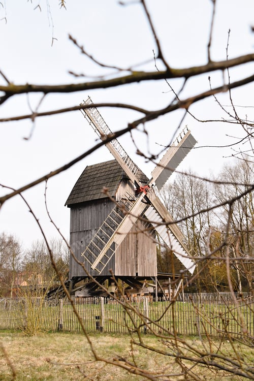 Preview: old wooden windmill in rural landscape
