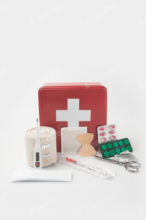 Preview: first-aid kit with medical supplies isolated on white